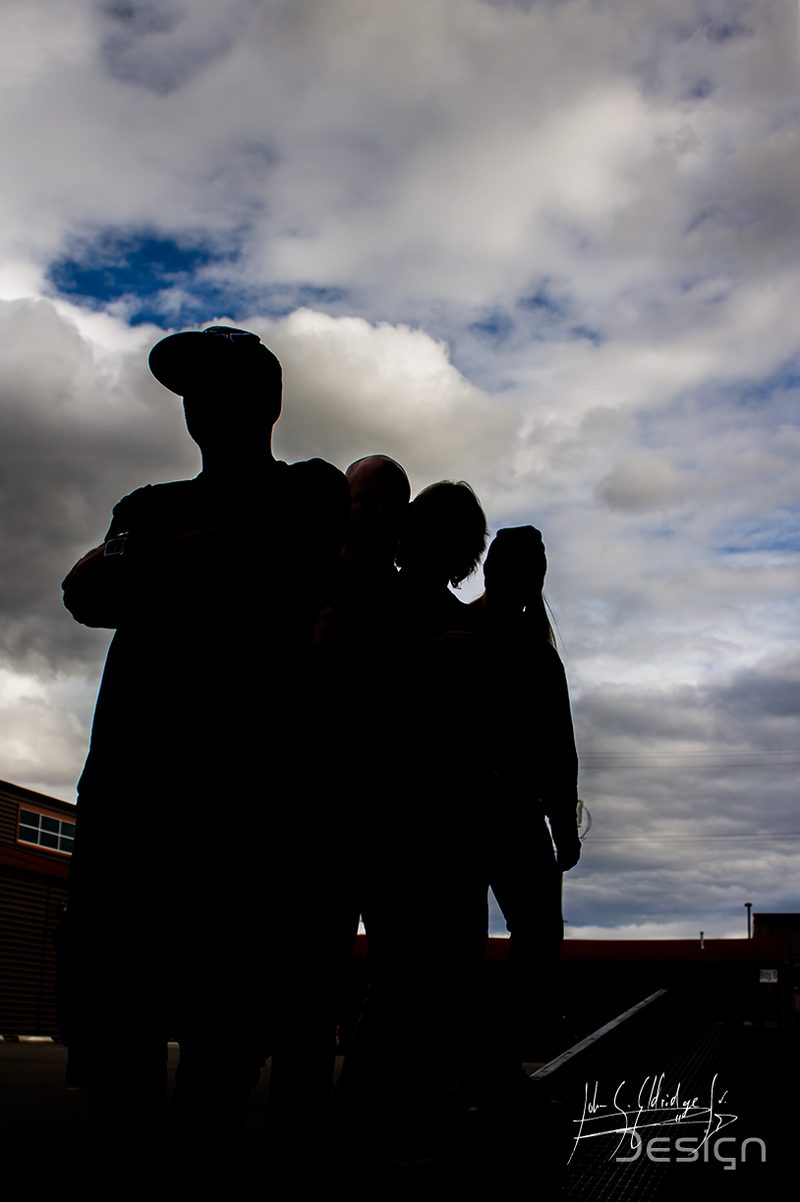 Silhouettes against a broken sky — the frame from that session I would still shoot the same way.
