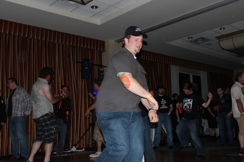 Crypticon 2012 — evening event, attendees socializing with drinks