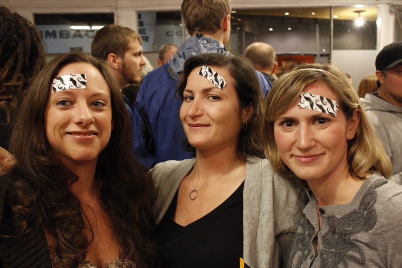 Guests wearing the mustache mark